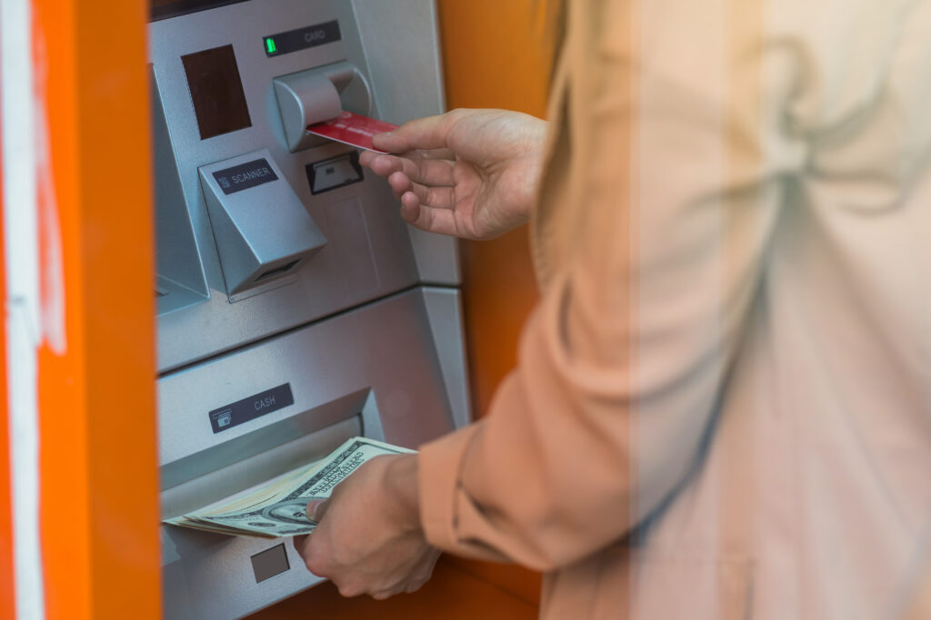 woman withdrawing the cash via atm business autom 2021 08 30 12 38 50 utc scaled